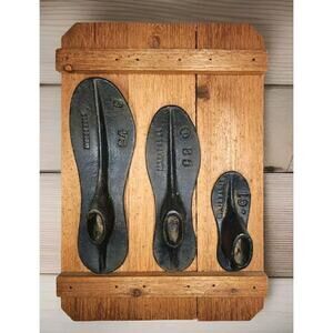 Three Antique Wood-Mounted Cast Iron Shoe Forms Industrial Art Sculpture 10"×15"